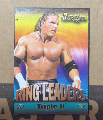 2003 Fleer WWE Aggression Ring Leaders #1RL Triple H — front
