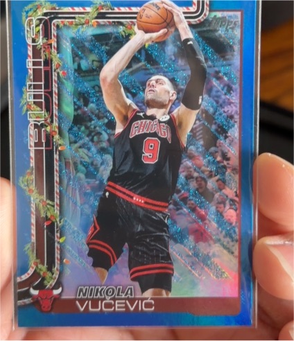 2025-26 Topps Holiday #H29 Nikola Vucevic Blue Metallic Glitter — front
