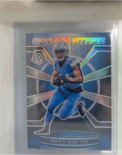 2025 Panini Mosaic #23 Amon-Ra St. Brown Center Stage Silver Mosaic — front