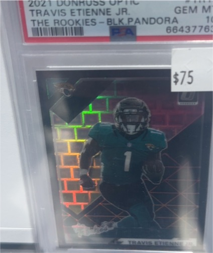 2021 Donruss Optic The Rookies #TR-12 Travis Etienne Jr. — front