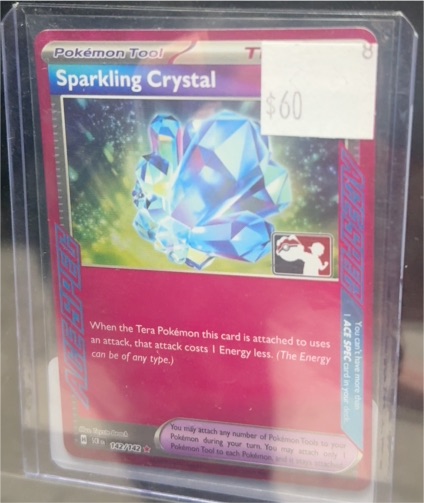 2024 Pokémon Prismatic Evolutions #129 Sparkling Crystal — front