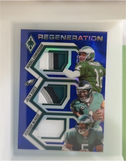 2025 Panini Phoenix Regeneration #RGN-PHI Randall Cunningham / Jalen Hurts / Donovan McNabb — front