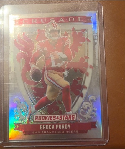 2025 Panini Rookies & Stars Crusade Silver Prizm #10 Brock Purdy — front