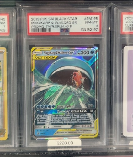 2019 Pokémon SM Black Star Promo #SM166 Magikarp & Wailord GX — front