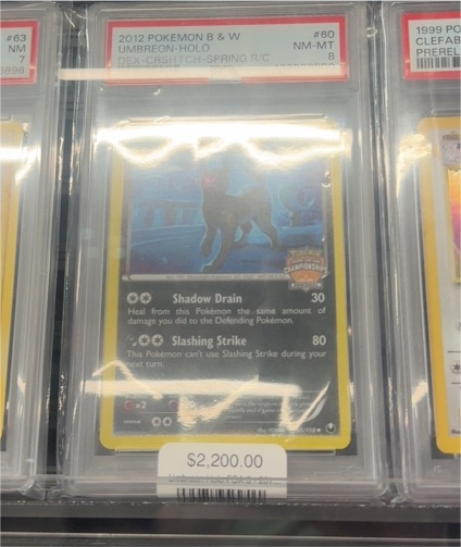 2012 Pokemon B&W #60 Umbreon Holo DEX-CSHITCH-SPRING R/C — front