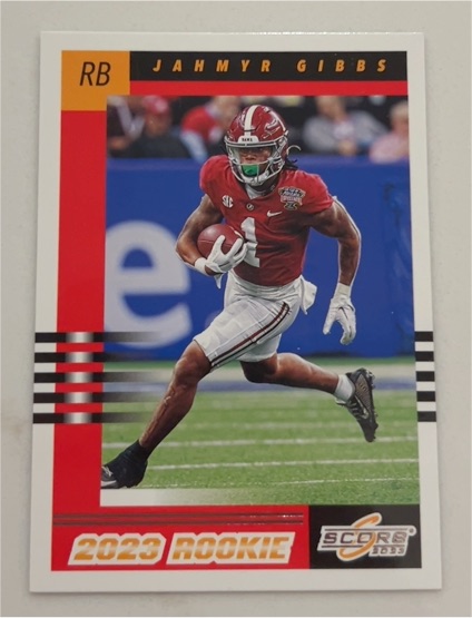 2023 Panini Score #9 Jahmyr Gibbs Retro Rookie — front