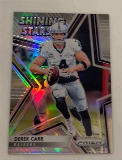 2016 Panini Prizm #24 Derek Carr Shining Stars Silver Prizm — front