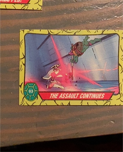 1989 Topps Teenage Mutant Ninja Turtles #83 The Assault Continues — front