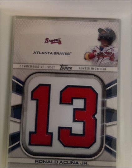 2022 Topps Series 1 #JNM-RA Ronald Acuña Jr. Commemorative Jersey Number Medallion — front