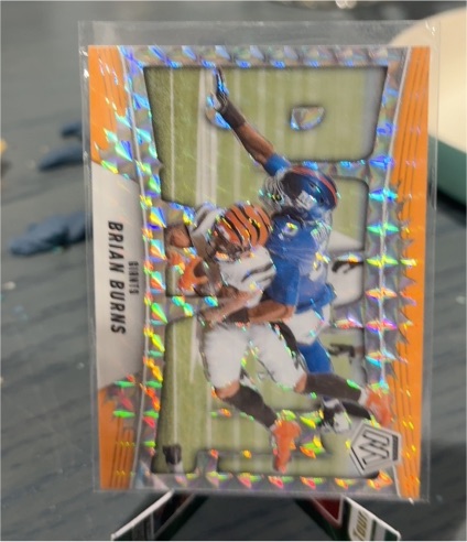 2025 Panini Mosaic #7 Brian Burns Bang! Orange Fluorescent — front