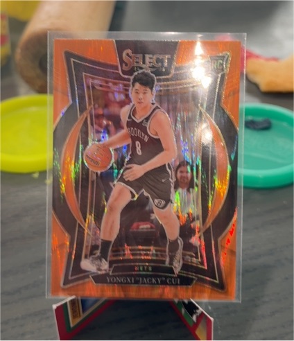 2024-25 Panini Select #94 Yongxi "Jacky" Cui Orange Flash Prizm Rookie — front