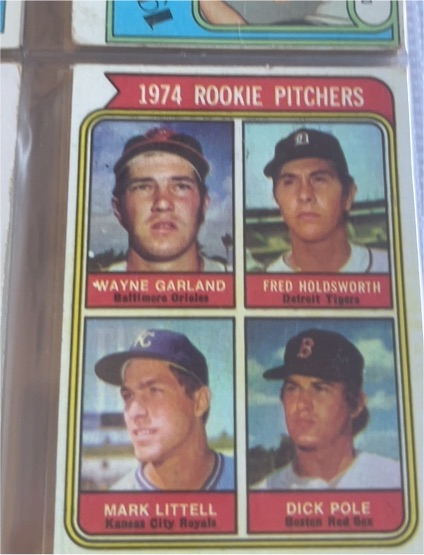 1974 Topps #596 Rookie Pitchers Wayne Garland Fred Holdsworth Mark Littell Dick Pole — front