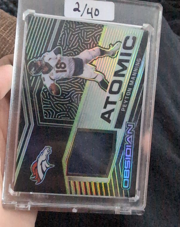 2021 Panini Obsidian Atomic #AM Peyton Manning — front