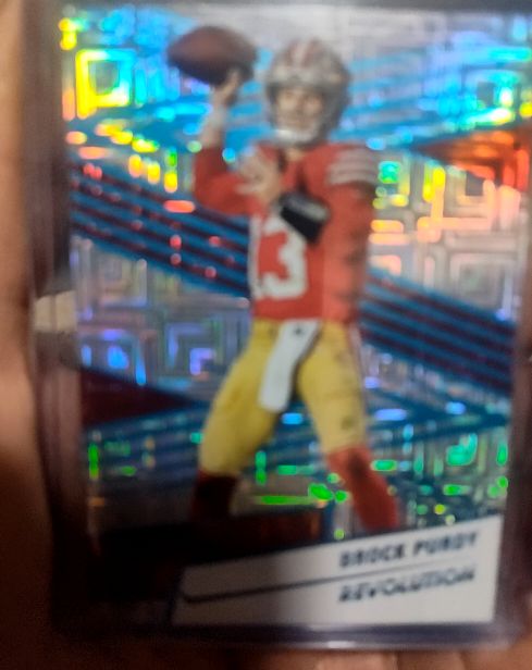 2025 Panini Revolution #150 Brock Purdy — front