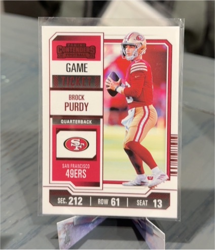 2023 Panini Contenders #86 Brock Purdy Red Game Ticket — front