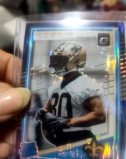 2025 Panini Donruss Optic #282 Devin Neal Purple Shock Prizm Rated Rookie — front