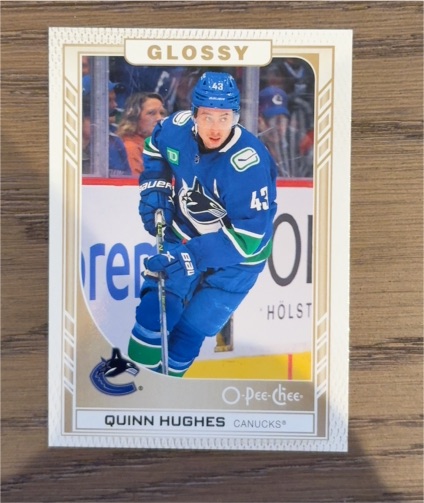 2023-24 Upper Deck Series 1 O-Pee-Chee Glossy #R-20 Quinn Hughes — front