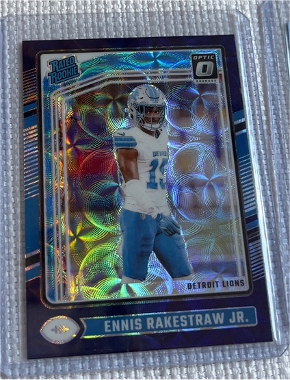 2024 Donruss Optic #232 Ennis Rakestraw Jr. Purple Shock Prizm Rookie Detroit Lions — front