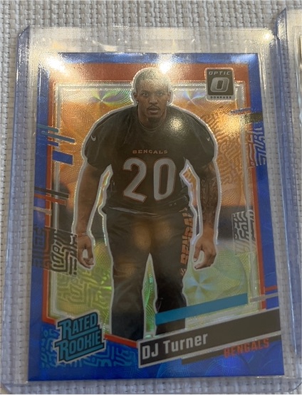 2023 Donruss Optic #319 DJ Turner Rated Rookie Blue Scope Prizm — front
