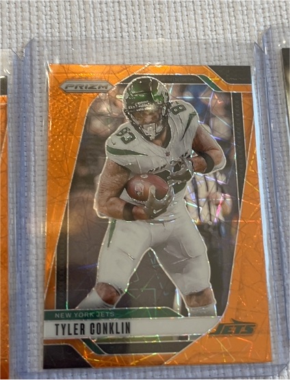 2024 Panini Prizm #225 Tyler Conklin Orange Lazer Prizm New York Jets — front