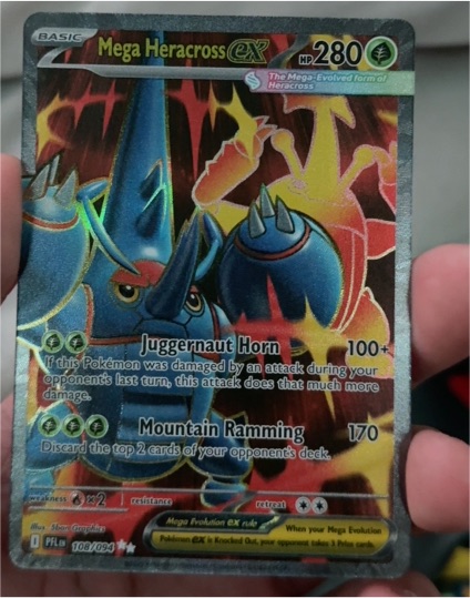 Mega Heracross EX 108/094 Me02: Phantasmal Flames — front