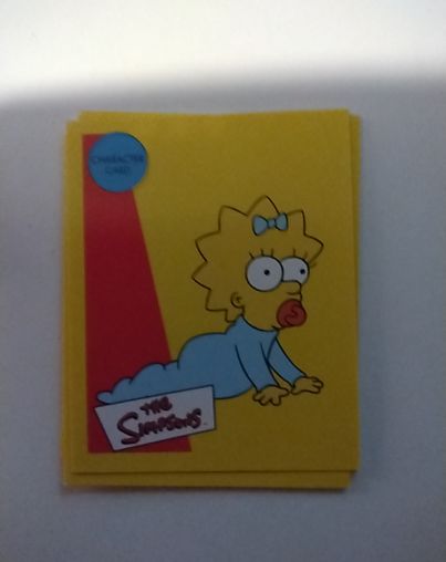 1993 Skybox The Simpsons Series 1 Wiggle Card W1 Maggie Simpson — front