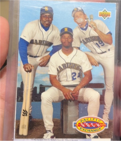 1993 Upper Deck Pacific Sock Exchange #55 Ken Griffey Jr./Jay Buhner/Kevin Mitchell — front