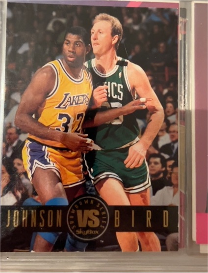 1994 Skybox Showdown Series #SS12 Magic Johnson vs Larry Bird — front