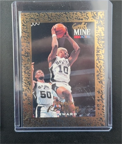 1995 Skybox NBA Hoops Gold Mine #448 Dennis Rodman — front