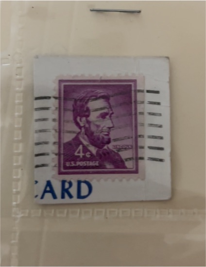 1954 U.S. Postage 4¢ Abraham Lincoln Purple Stamp — front