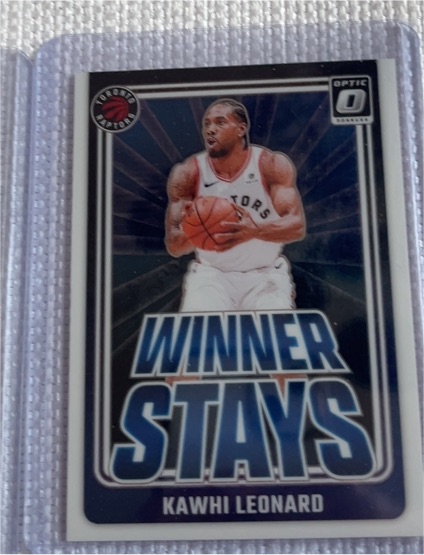 2024-25 Panini Donruss Optic #8 Kawhi Leonard Winner Stays — front