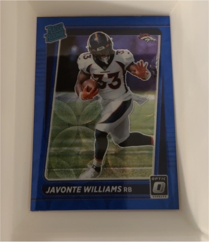 2021 Donruss Optic #215 Javonte Williams Blue Scope Prizm Rated Rookie — front