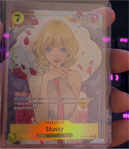 One Piece Card Game 2023 OP13-110 Stussy Alternate Art Carrying On His Will — front