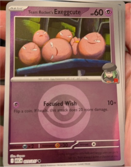 2026 Pokémon Ascended Heroes #077 Team Rocket's Exeggcute — front