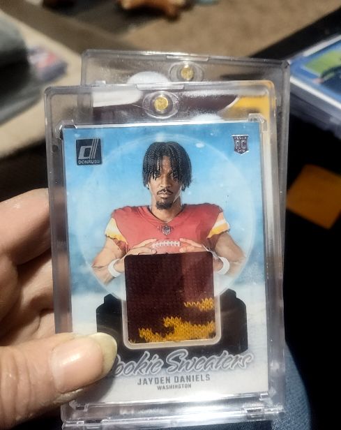 2024 Donruss Rookie Holiday Sweaters #RHS-JDA Jayden Daniels — front