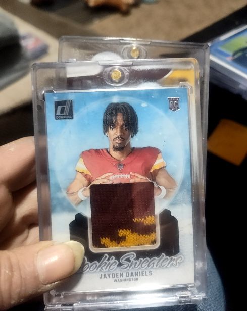 2024 Panini Donruss Rookie Holiday Sweater #RHS-JDA Jayden Daniels — front