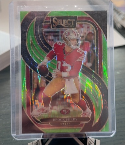 2024 Panini Select #124 Brock Purdy Green & Yellow Prizm Shock — front