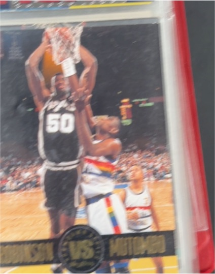 1993-94 SkyBox Premium #SS6 David Robinson vs. Dikembe Mutombo — front