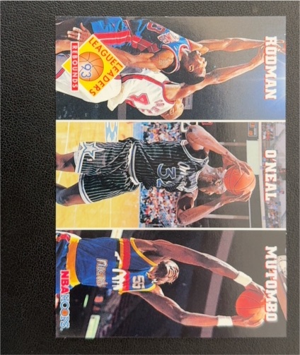 1993-94 NBA Hoops #284 Dennis Rodman / Shaquille O'Neal / Dikembe Mutombo — front