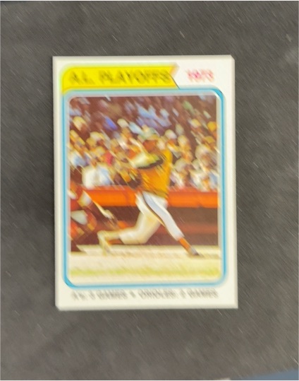 1974 Topps #470 A.L. Playoffs Reggie Jackson — front