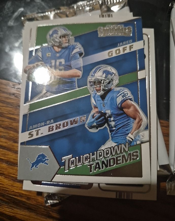2022 Panini Contenders #TDT-DET Jared Goff / Amon-Ra St. Brown Touchdown Tandems — front