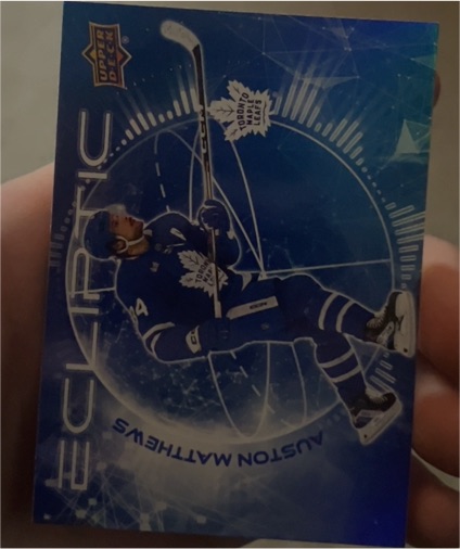2023-24 Upper Deck Series 2 Ecliptic #EC-10 Auston Matthews — front