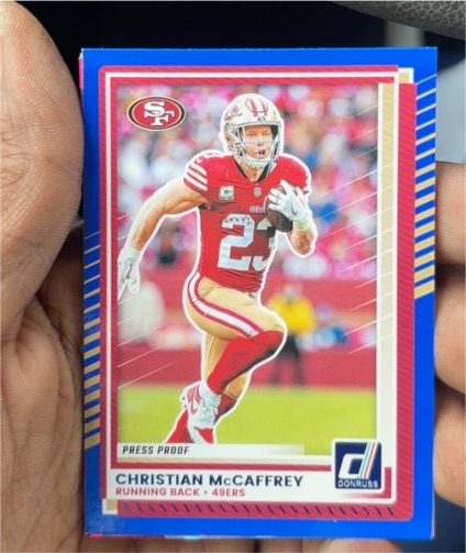 2025 Donruss #161 Christian McCaffrey Press Proof Blue — front