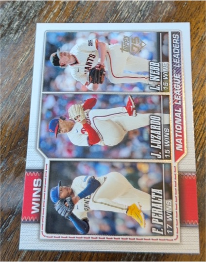 2026 Topps Series 1 #117 National League Wins Leaders Freddy Peralta, Jesús Luzardo, Logan Webb — front