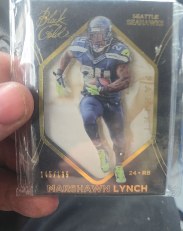 2014 Panini Black Gold #24 Marshawn Lynch — front
