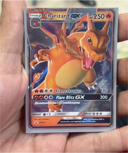 2019 Pokémon TCG #SM211 Charizard GX — front