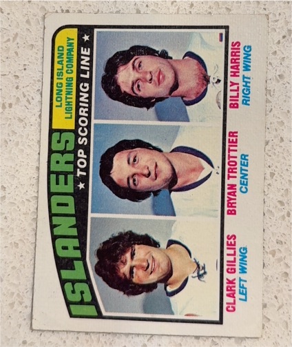 1976-77 Topps #216 Bryan Trottier, Clark Gillies, Billy Harris — front