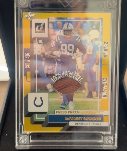 2022 Panini Donruss #55 DeForest Buckner Press Proof Yellow Game Used Ball — front