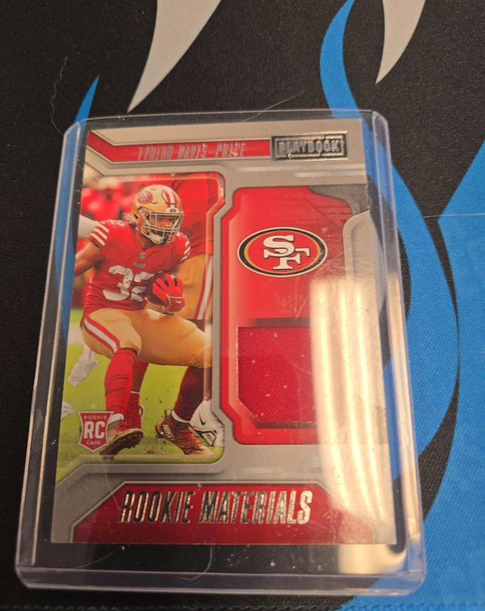 2022 Panini Playbook #RM-29 Tyrion Davis-Price Rookie Materials — front