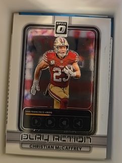 2025 Panini Donruss Optic #20 Christian McCaffrey Play Action — front